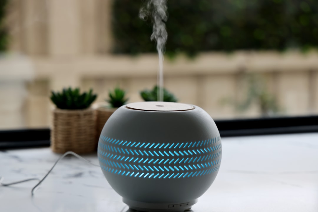 A compact dehumidifier operating in a home indoor grow space